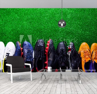 Picture of Various cleats against green artificial turf studio shot